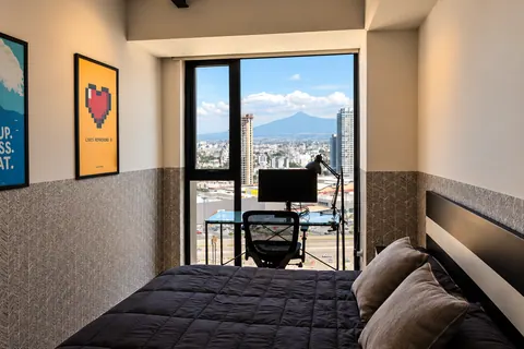 Bedroom with city views