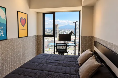 Bedroom with city views