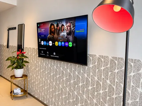 Living room with smart TV and warm lighting
