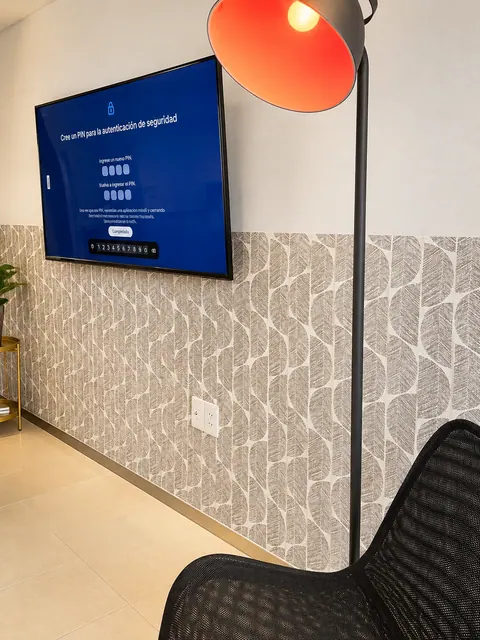 Living room with smart TV and warm lighting