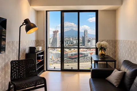 Living room with views of Puebla City and La Malinche